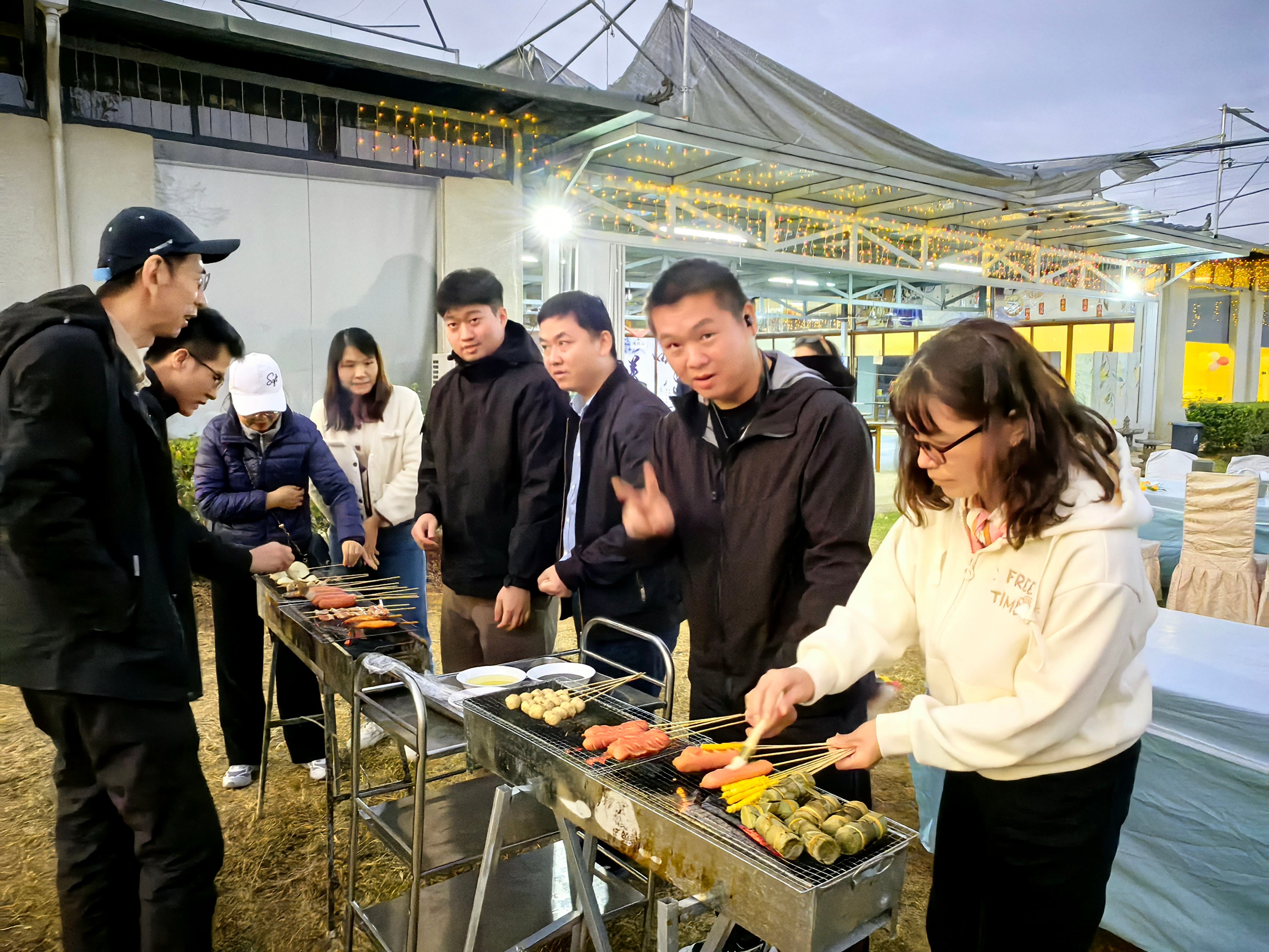 Ultra-Precision CNC Machining and Die Casting Services Engineer with Over 15 Years of Experience Enjoying Outdoor Barbecue